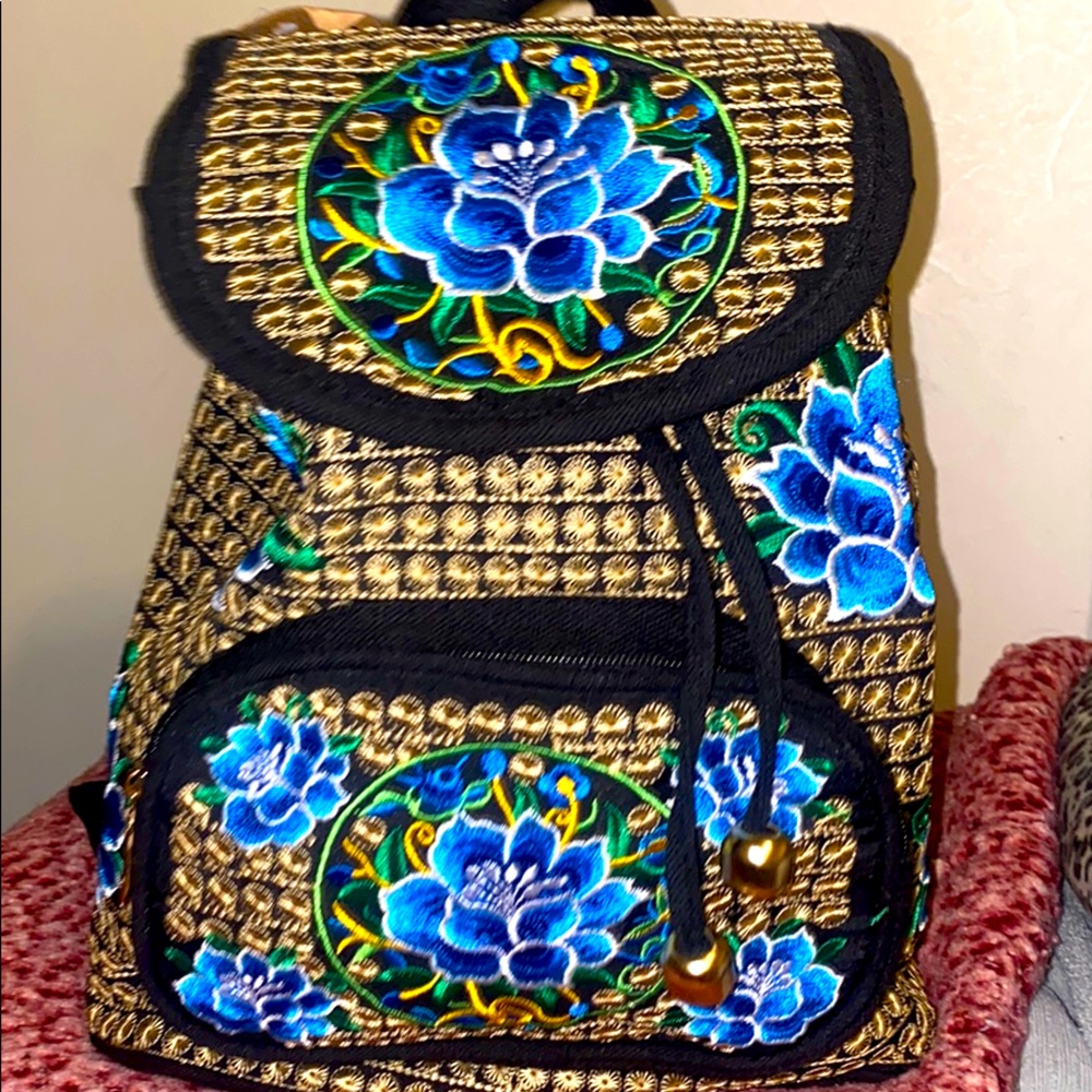 Embroidery canvas shoulder/backpack bag.